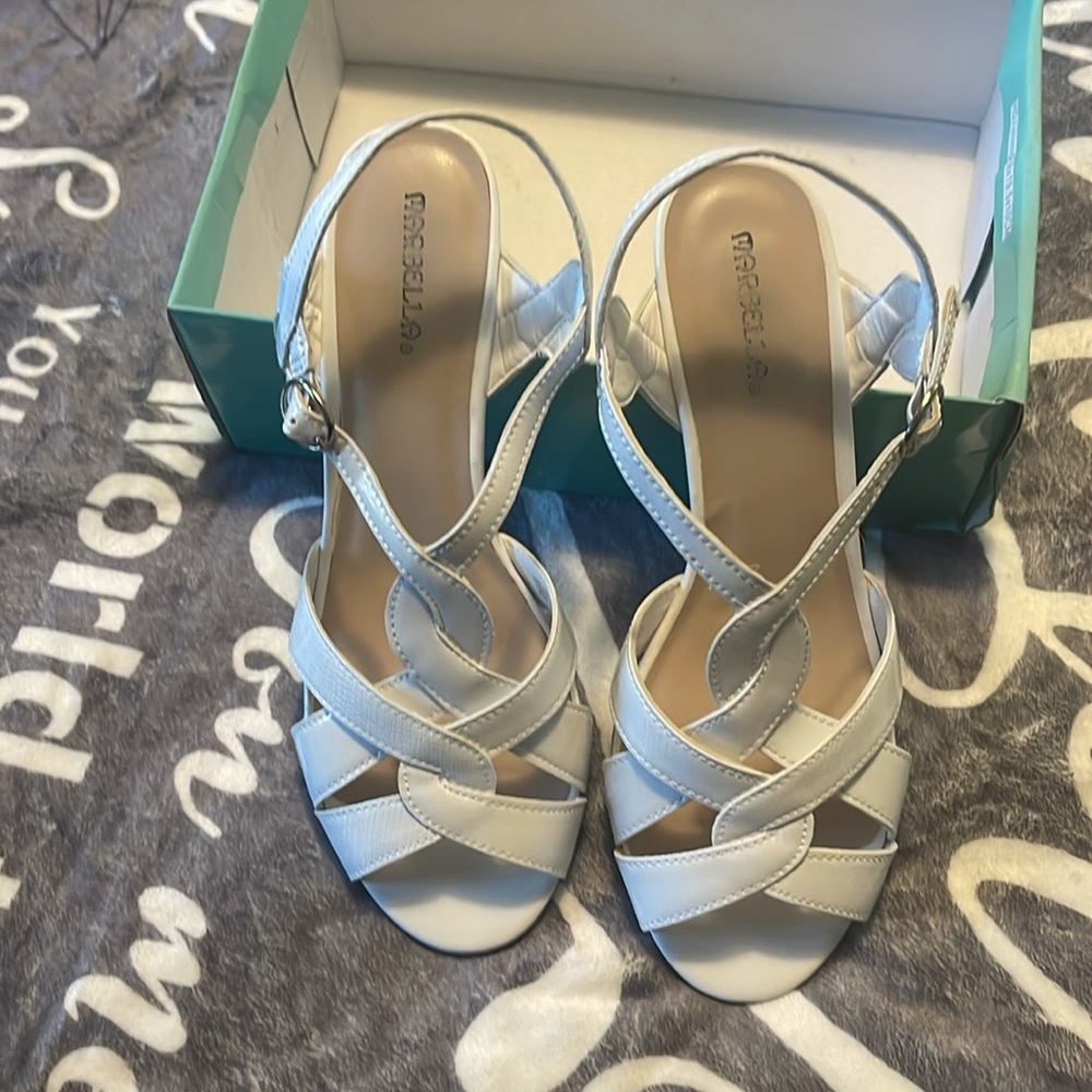 These are white sanders heels, in good condition; wore only a few times. - Picture 2 of 3